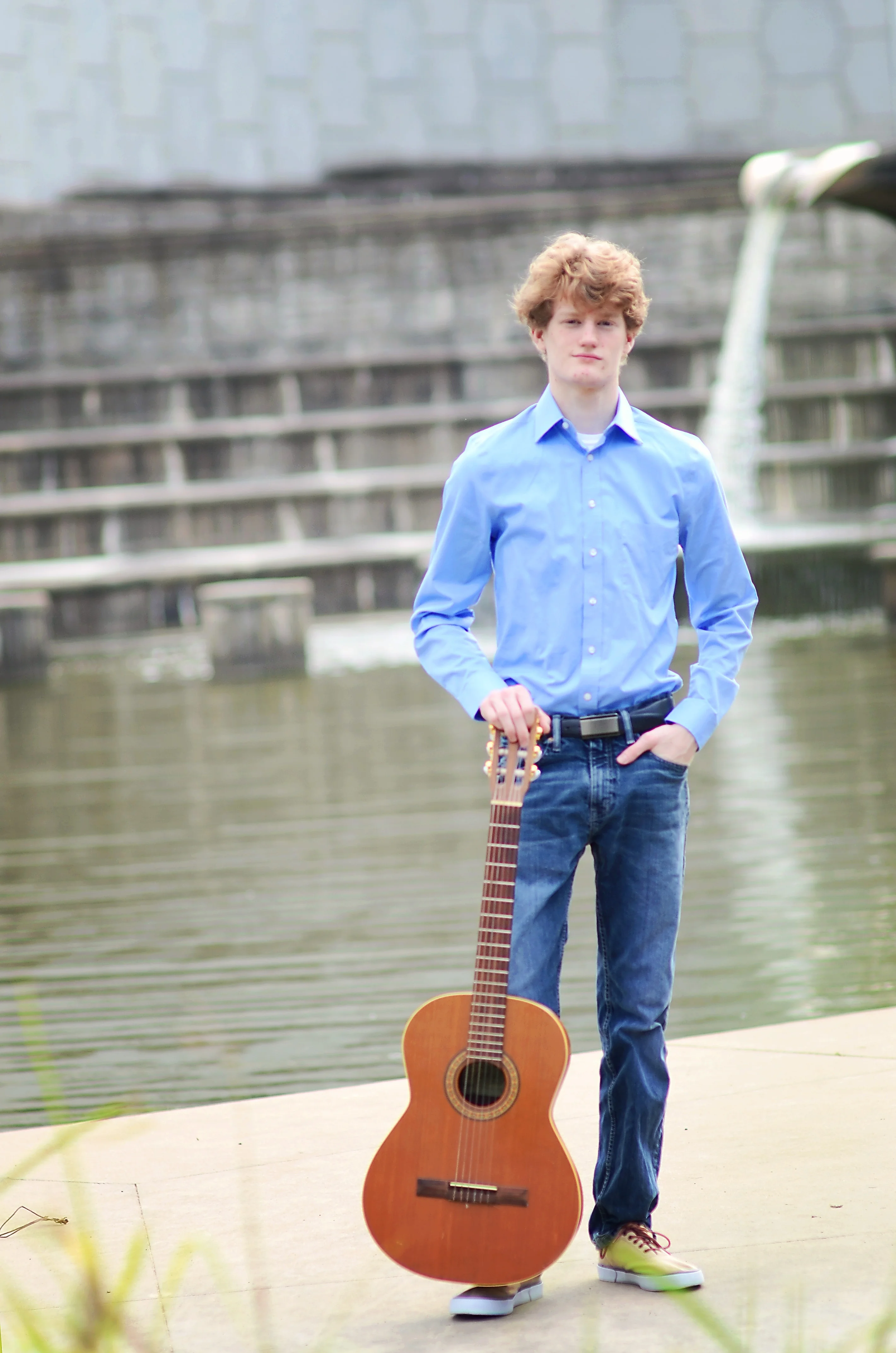 guitar_by_a_lake.webp